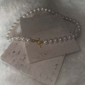 Imitation Pearl Choker Necklace Collar
Gold Color Lasso Pendant Necklace